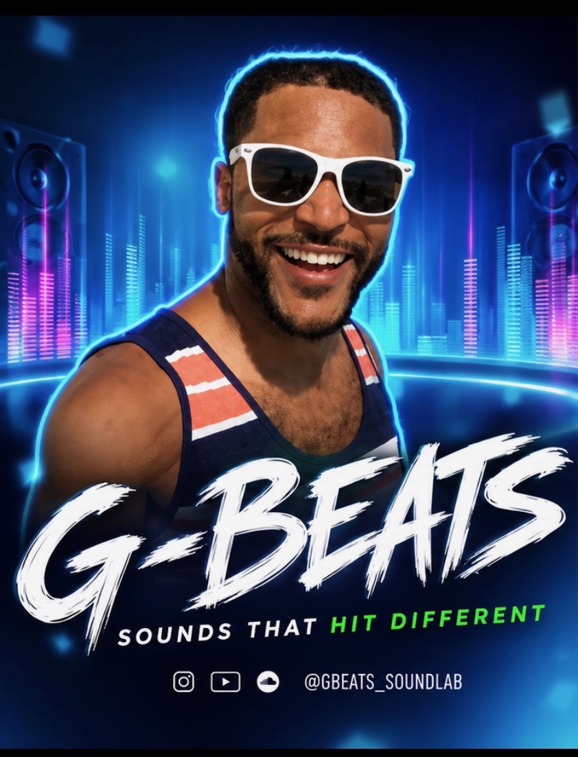 GBeats smiling in white sunglasses in a blue sound studio